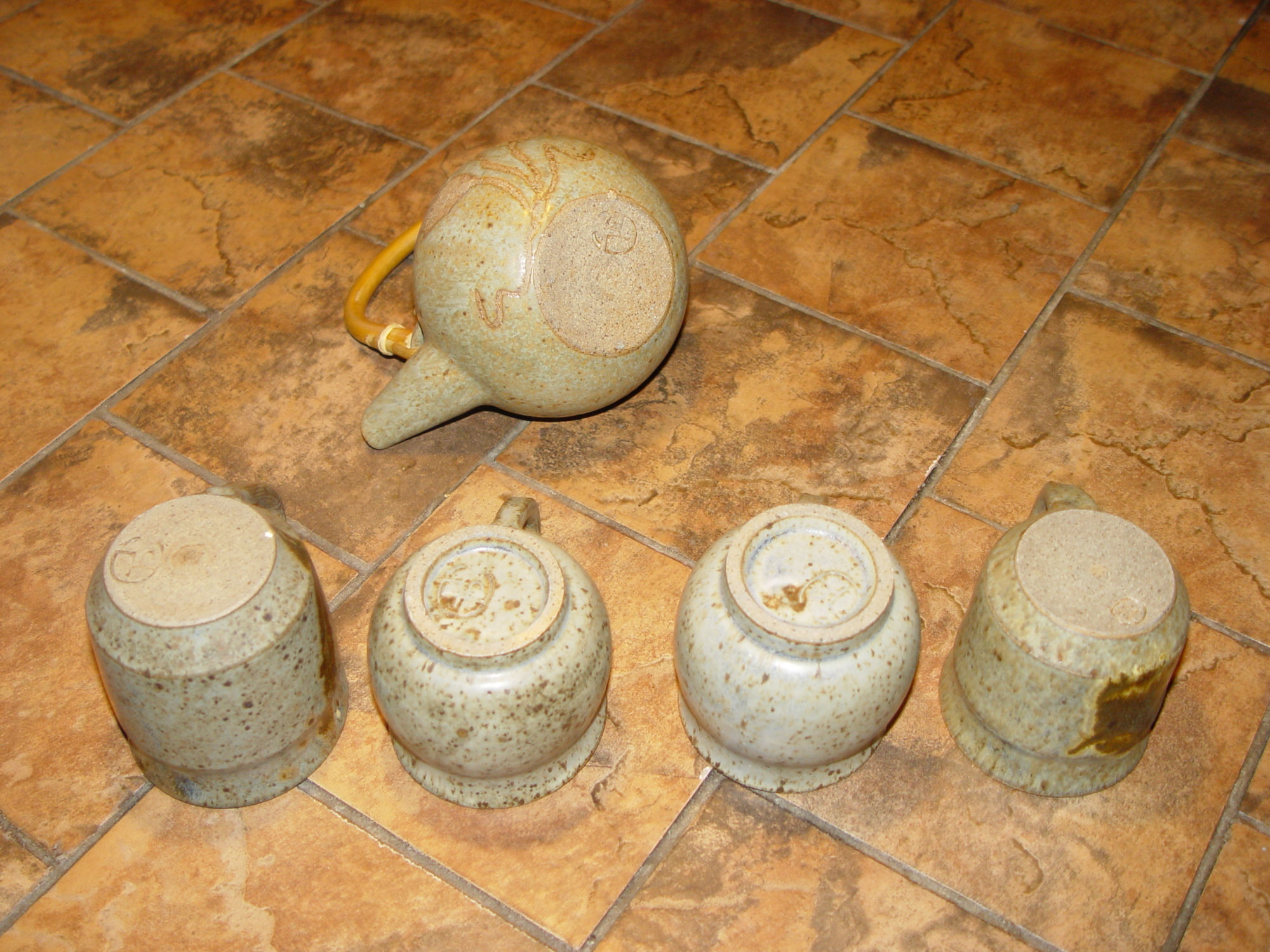 Vintage studio earthy ceramic teapot set with
                  cane handle chop mark