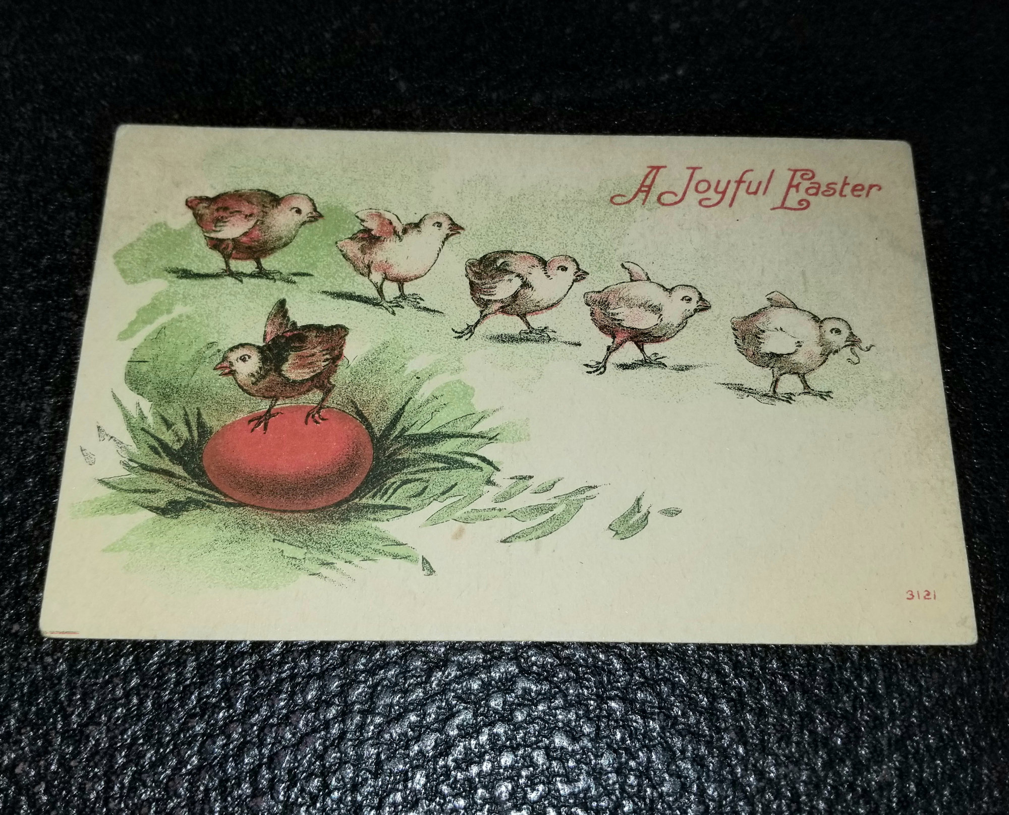 1900s Easter
                                                Postcard; Row of Chicks
                                                on a Red Egg 'A Joyful
                                                Easter'