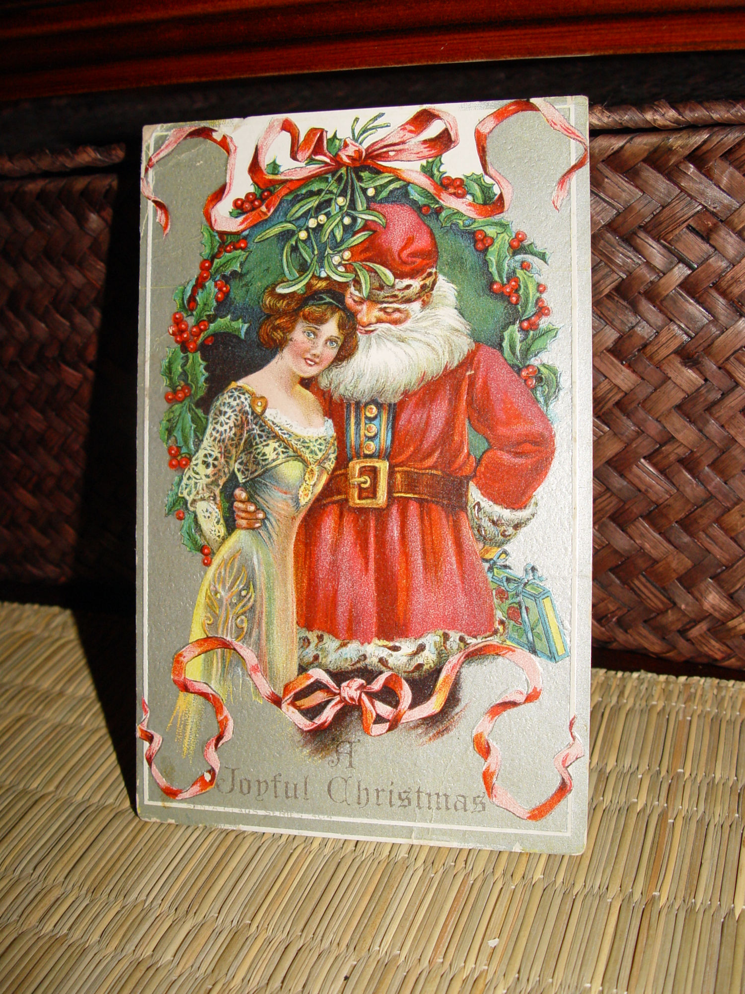 1900s Santa
                                                Claus Hugs Woman,
                                                Embossed Christmas
                                                Postcard Original AMP
                                                Co.