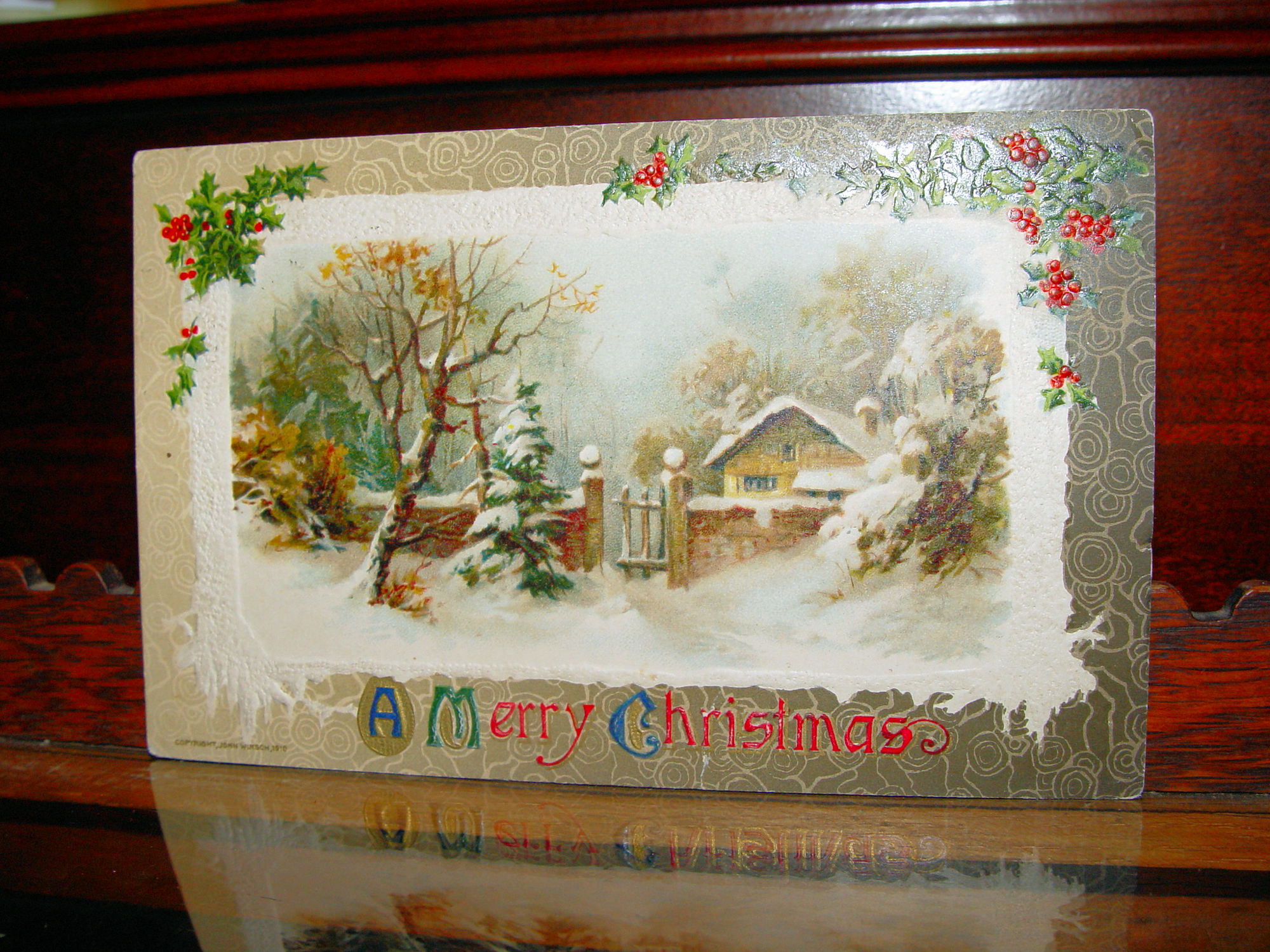 1910 'A Merry
                                                Christmas', Holly
                                                Berries and Cottage,
                                                John Winsch, Antique
                                                Postcard