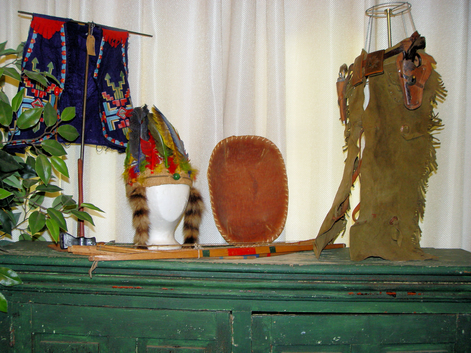 1920s - 30s Child's Cowboy
                                        & Indian; Headdress,
                                        Tomahawk, Chaps, Holster, Guns